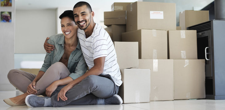 couple with moving boxes